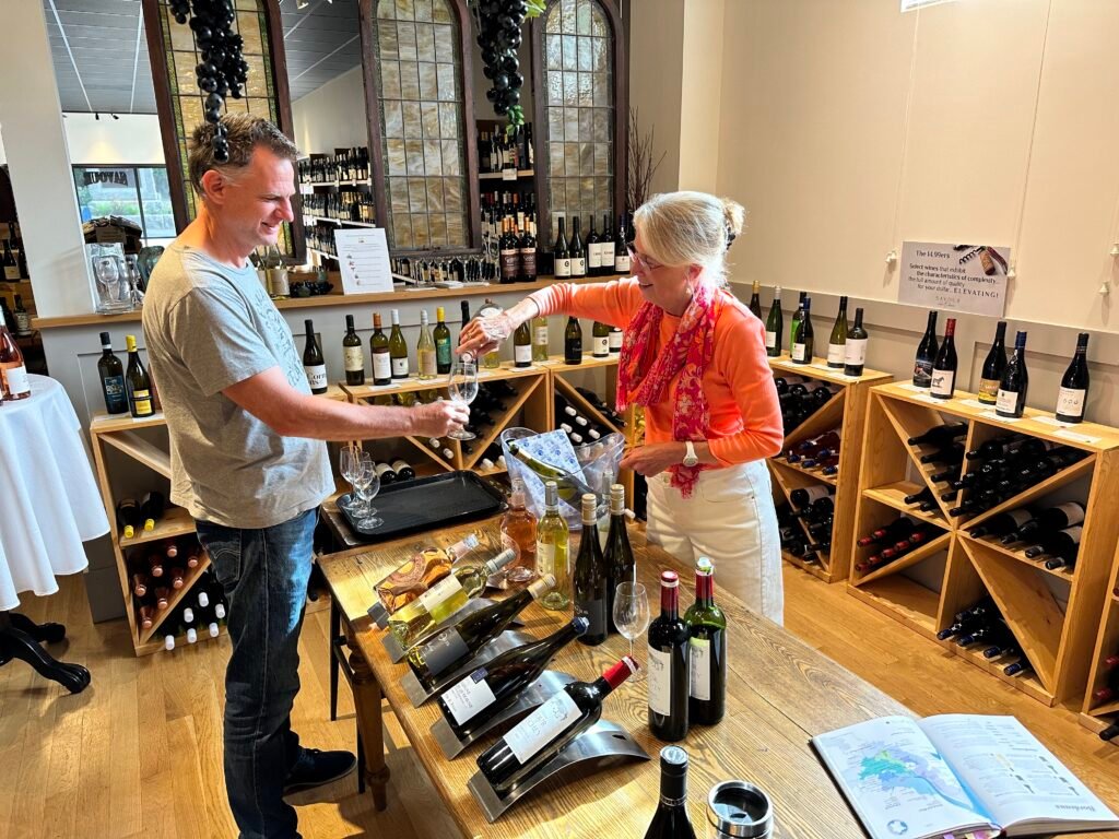 Susan sharing wine at Savour Wine Shop in Gloucester, MA